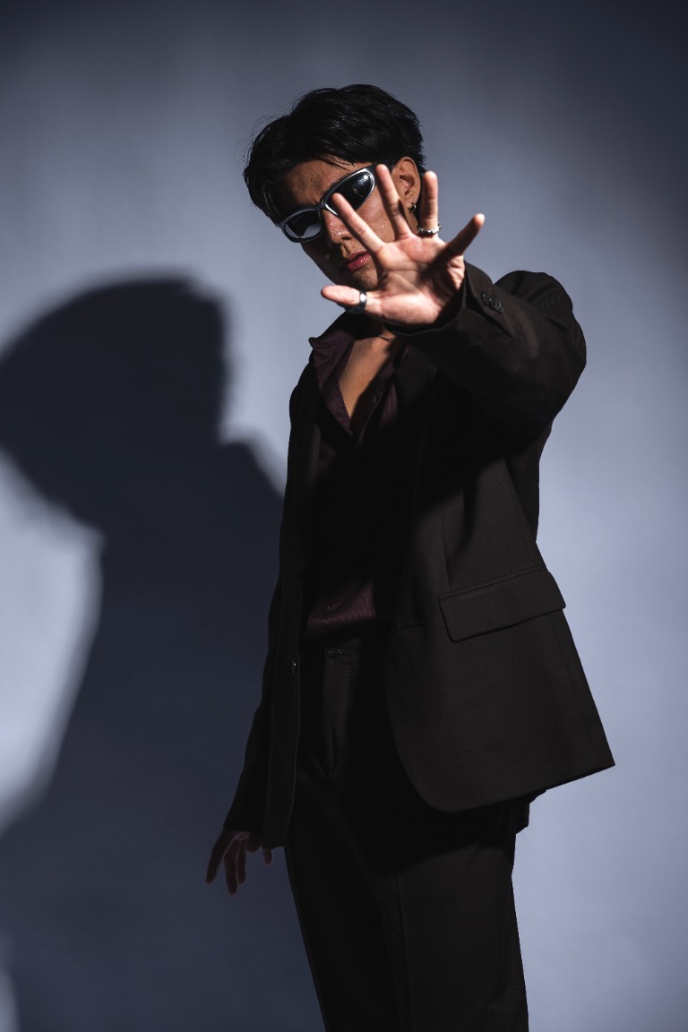 Hongpo modelling in a black suit